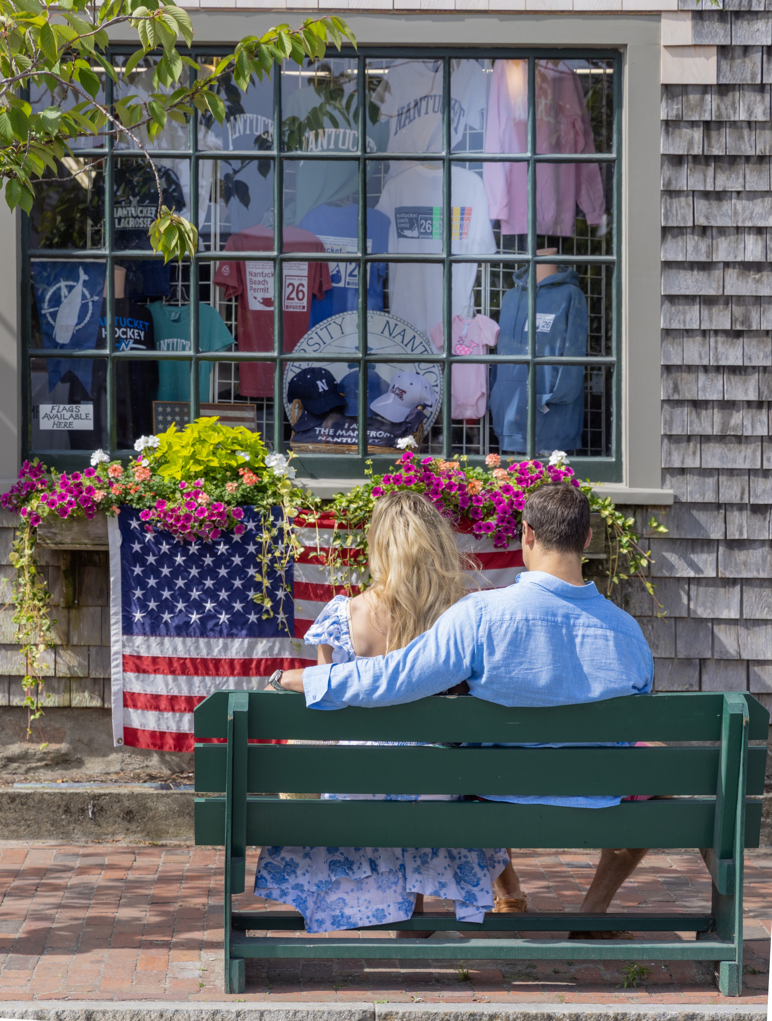 Couple Sitting On A Bench In Downtown Nantucket