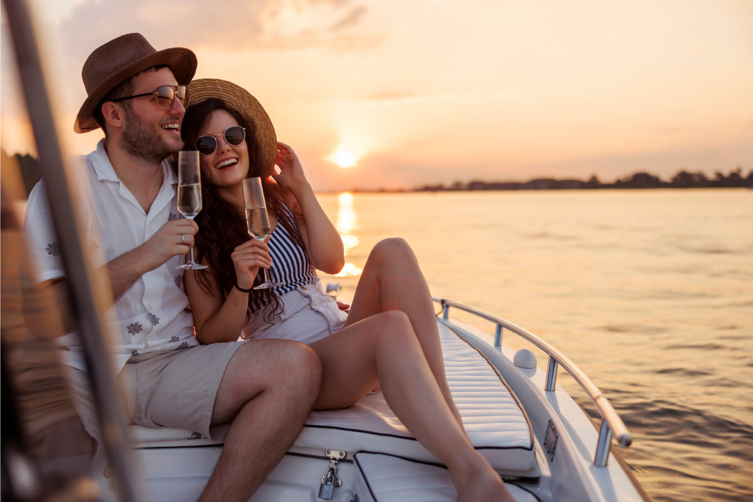 Couple enjoying the sunset on a boat